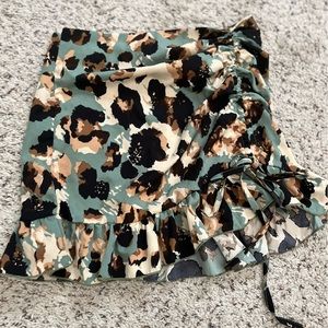 Olive green skirt with black and gold cheetah print. Size xs
